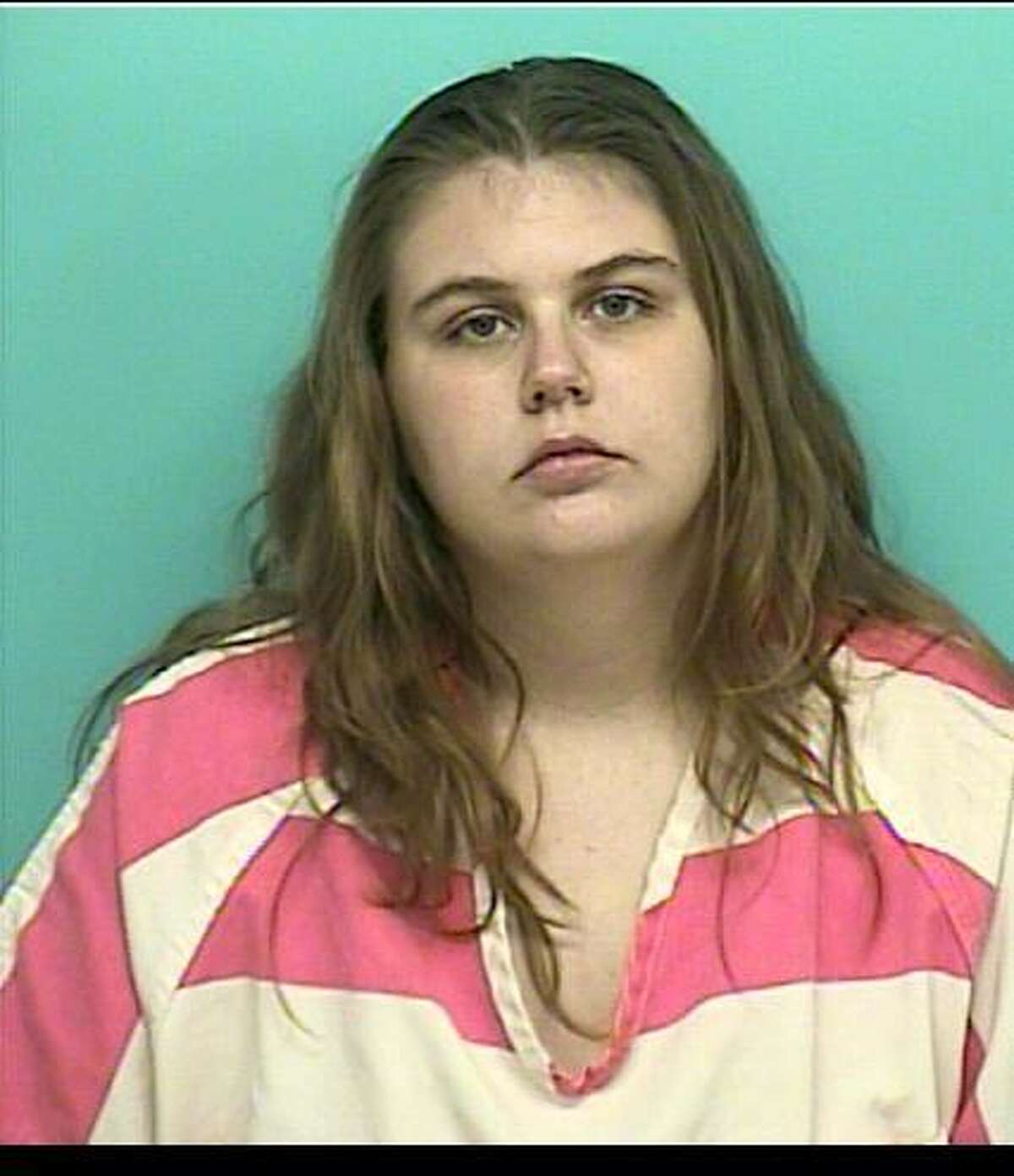Charlene Ellet, 24, of Porter, is jailed on $50,000 bond, accused of assaulting a family member. Photo: Montgomery County Sheriff's Office