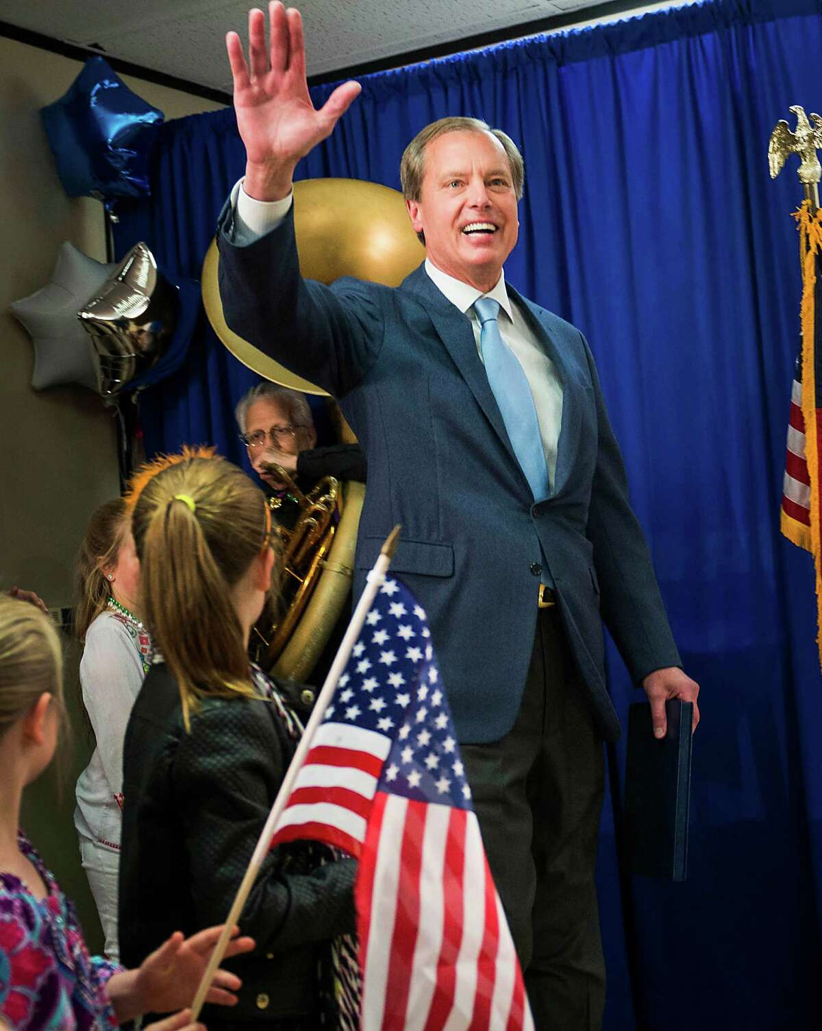 Texas lieutenant governor candidate Lt. Gov. David Dewhurst waves to supporters as he arrives for an election night party at his Houston campaign headquarters on Tuesday, March 4, 2014, in Houston. Dewhurst faces three Republican challengers for re-election in the primary. ( Smiley N. Pool / Houston Chronicle )