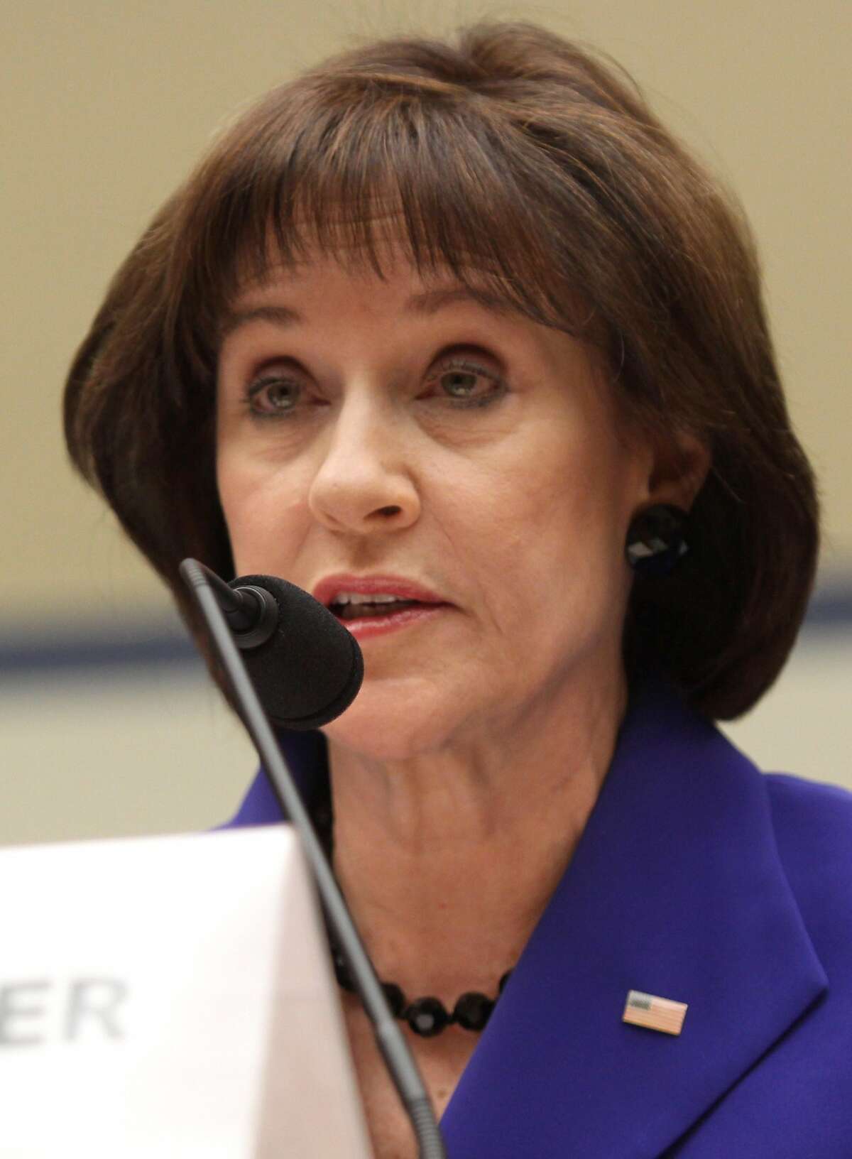 Former Internal Revenue Service (IRS) official Lois Lerner speaks on Capitol Hill in Washington, Wednesday, March 5, 2014, during the House Oversight and Government Reform Committee hearing on the the agency's targeting of tea party groups, where she invoked her constitutional right not to incriminate herself. (AP Photo/Lauren Victoria Burke)