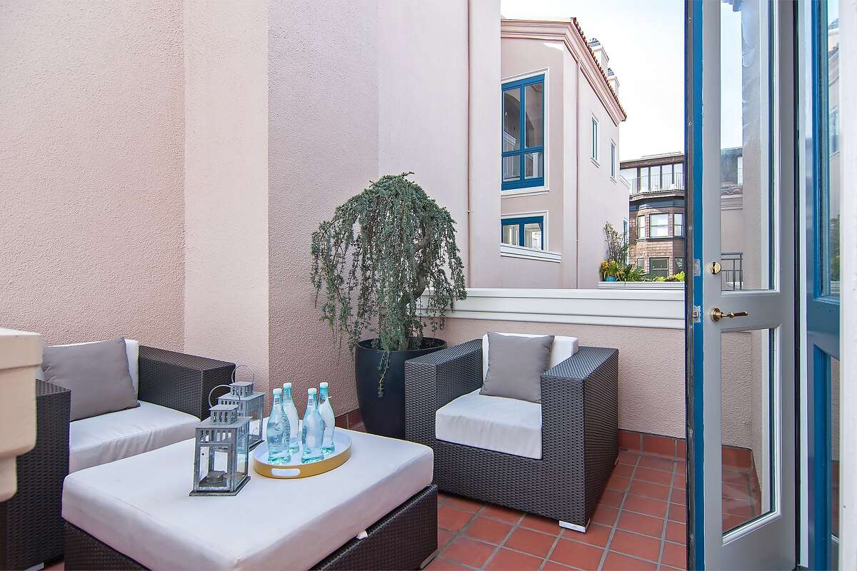 Trilevel Telegraph Hill condo features five terraces