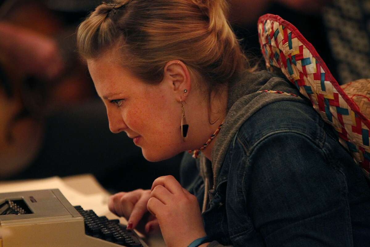 Melanie Rubin, 23, types notes to friends with a typewriter during Unplug SF March 7, 2014 at Broadway Studios in North Beach in San Francisco, Calif. The event, which required all attendants to surrender their cellphones and all "digital technology" at the door, offered an array of activities such as crafts, puzzles, various forms of artwork and live music as well as others. The party was put on by Reboot, Digital Detox and Camp Grounded, in conjunction with the fifth annual National Day of Unplugging.