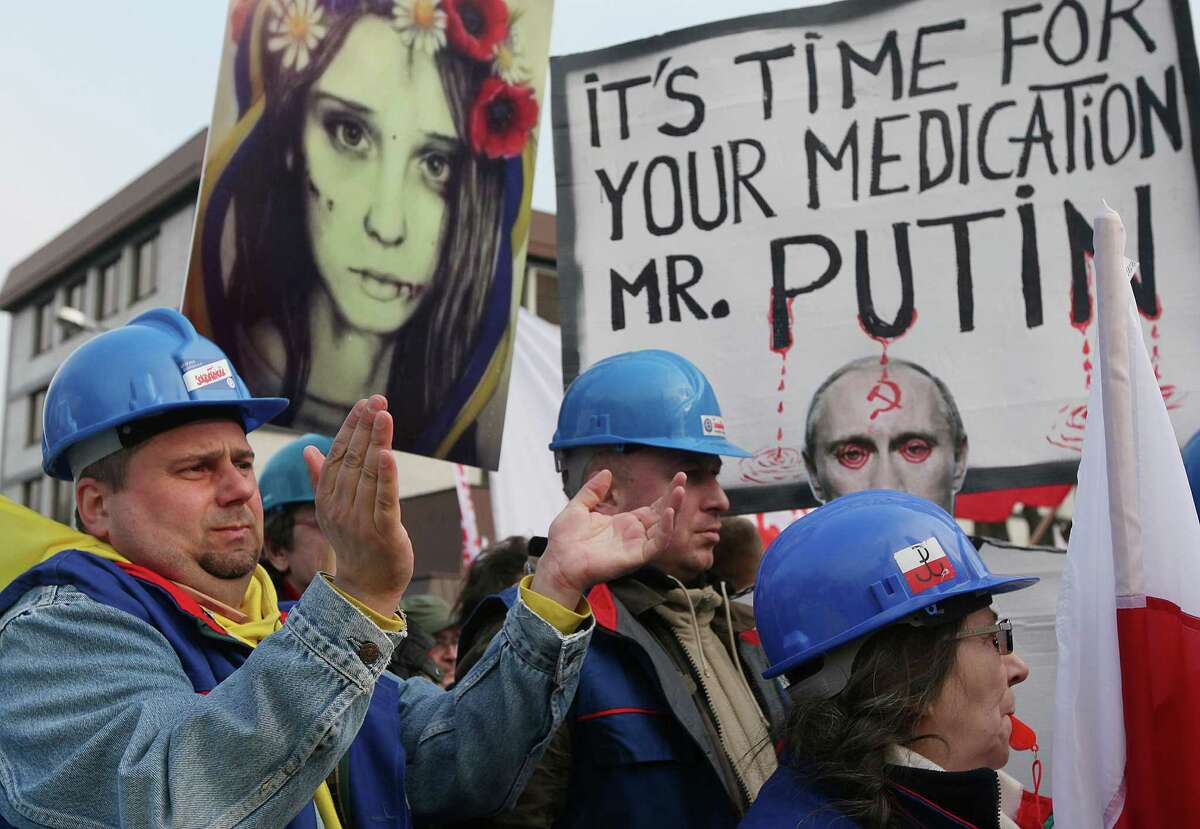 World news photos: Femen in U.S., dramatic horse rescue and more