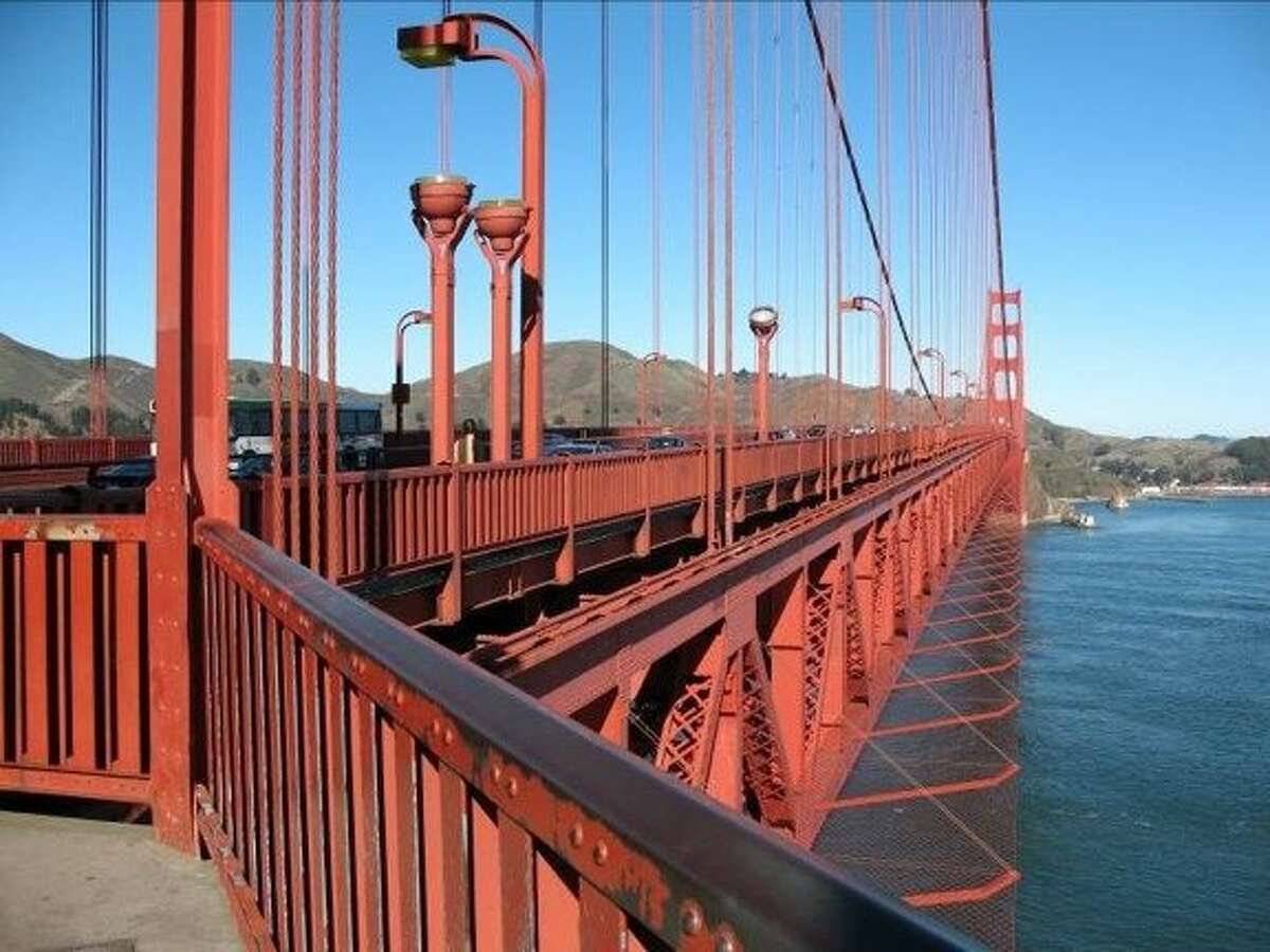 Designs of new Golden Gate Bridge suicide barrier, including replacement rails and a net that extends out from the sides of the bridge. Courtesy of Golden Gate Bridge Highway and Transportation District