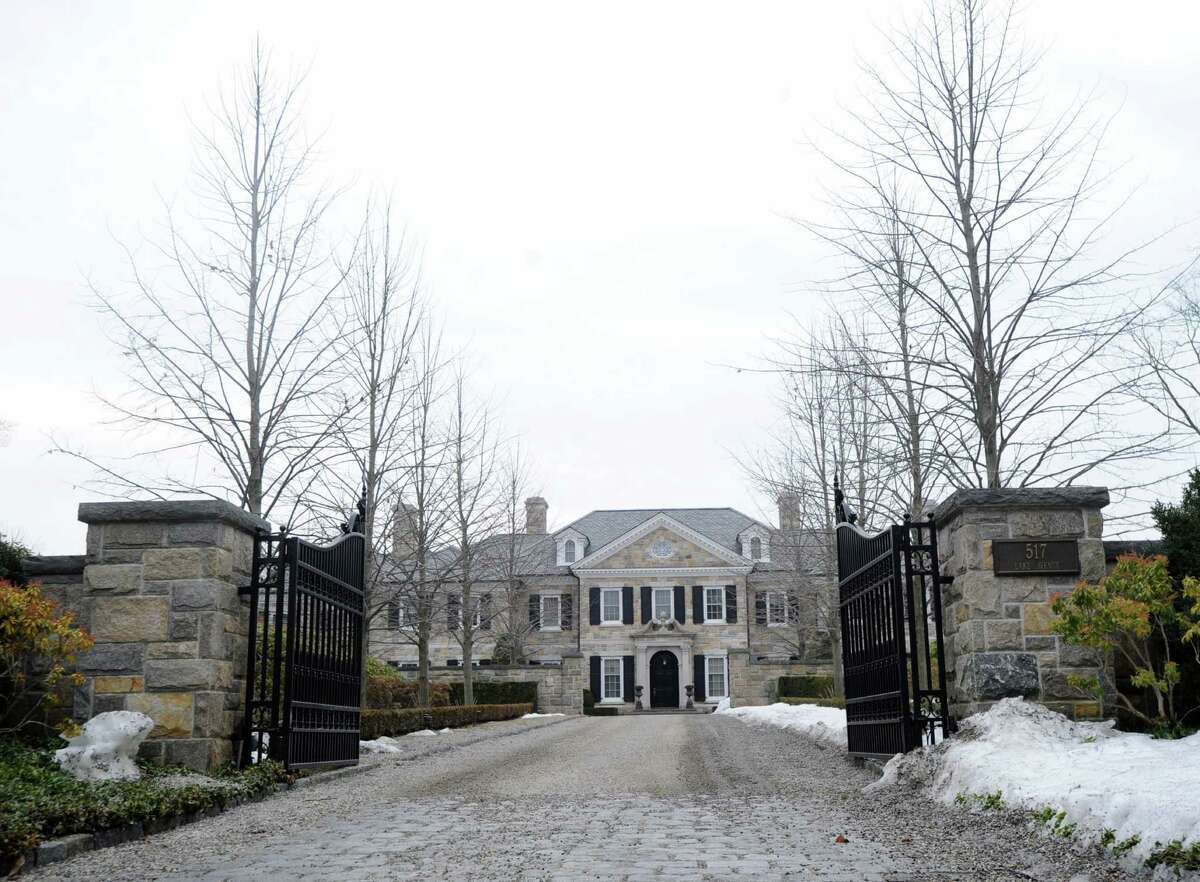 A cobblestone driveway leads into the gated home at 517 Lake Avenue in Greenwich Conn., Wednesday, March 12, 2014. Retired professor Stephen Higley has completed an urban study that has identified the "Golden Triangle" neighborhood bounded by North Street on the east, Round Hill Road on the west and the Merritt Parkway on the north in Greenwich, Connecticut, as the highest income neighborhood in the country.
