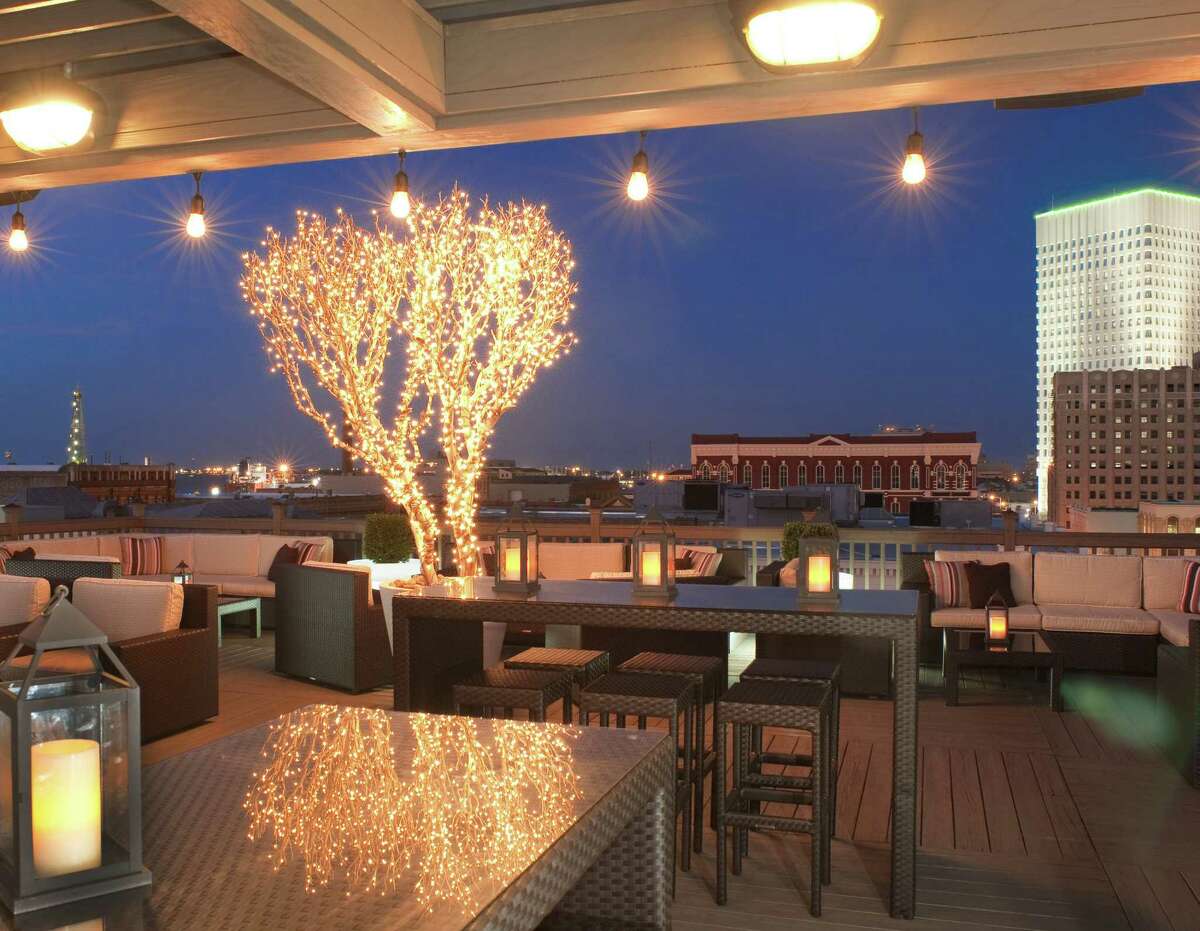 From the Tremont House Hotel's Rooftop Bar in Galveston, night views stretch from the harbor to the Gulf.