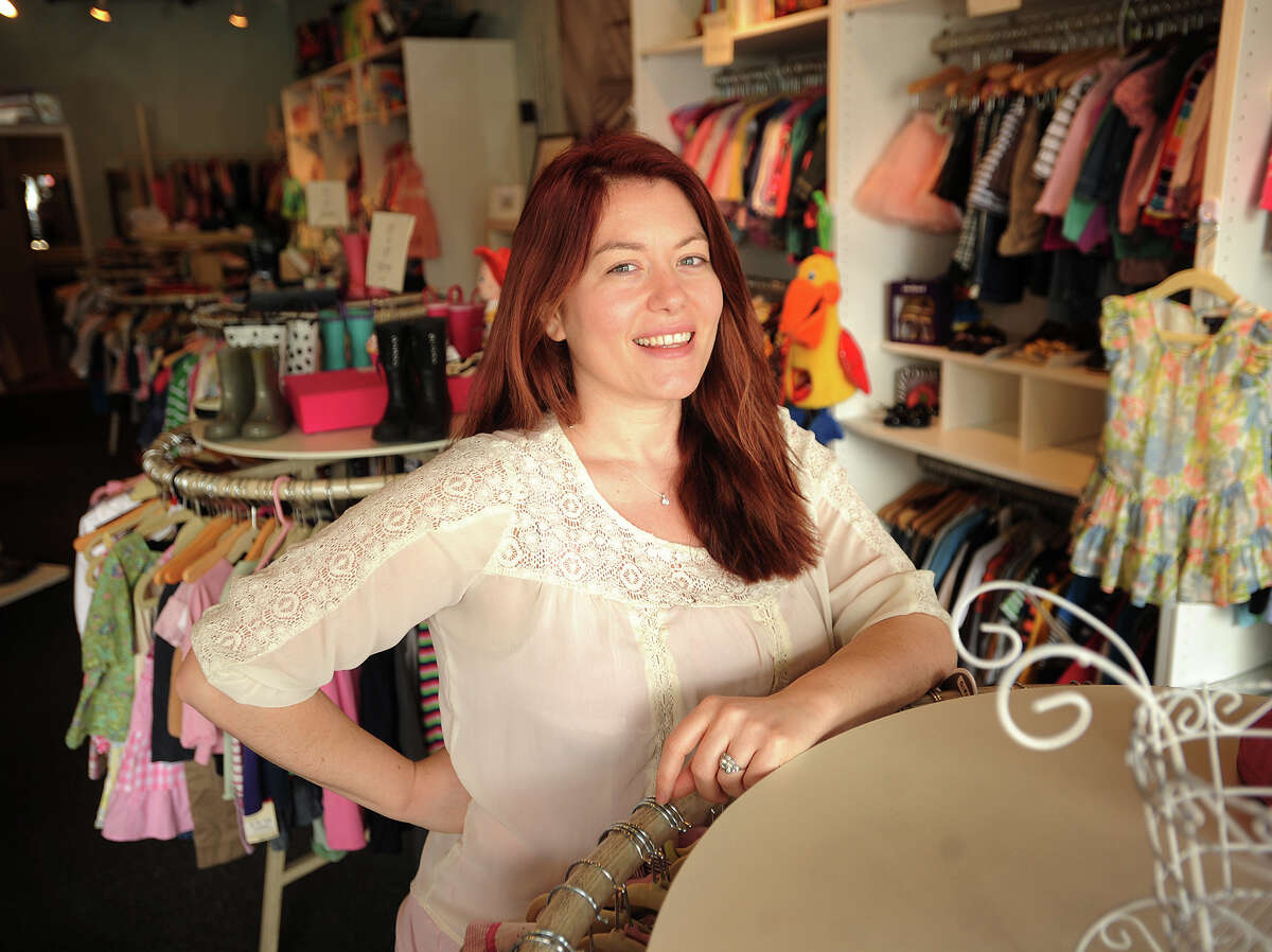 Taryn Bolotin of Westport, owner of Around the Rosy, a children's resale boutique at 222 Post Road West in Westport, Conn. on Thursday, March 13, 2014.