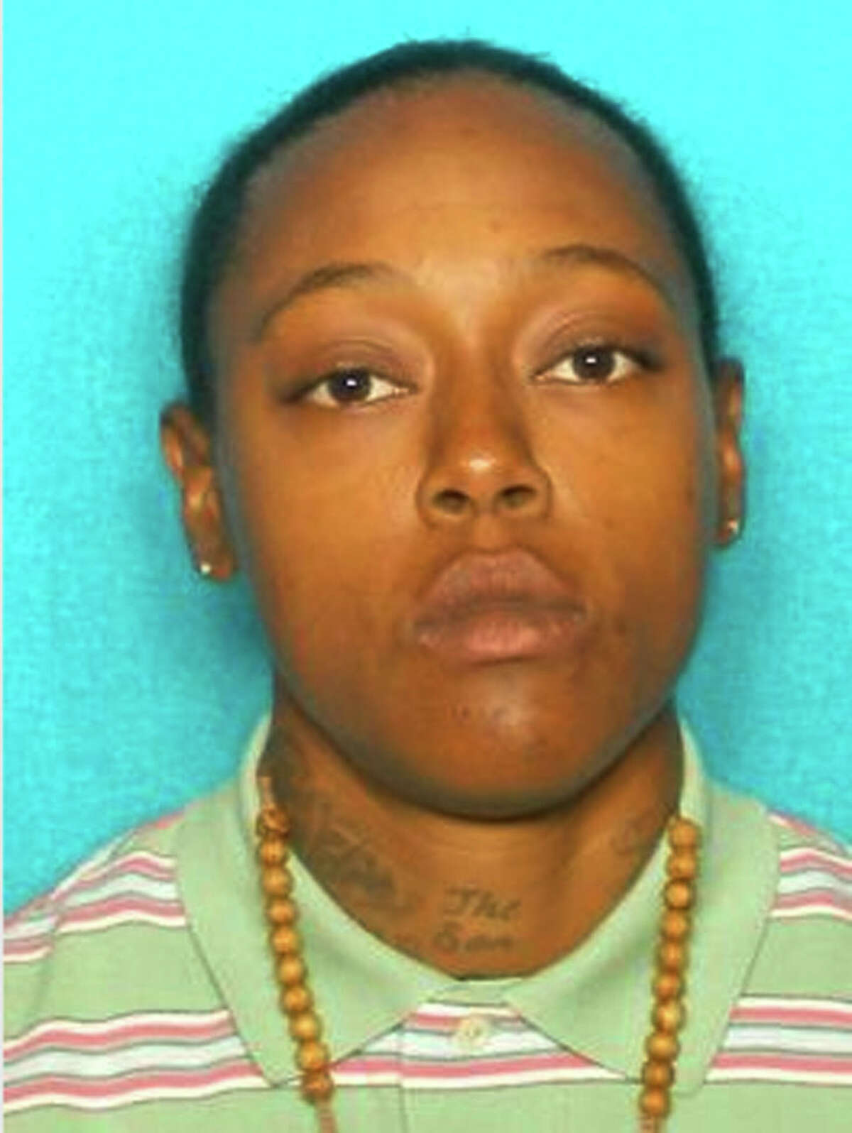 This photo provided by the Galveston County Sheriff's Office shows Britney Cosby, one of two Houston women whose bodies were found last week next to a dumpster in Port Bolivar. The father of one of two women who were slain and their bodies dumped next to a trash bin on the Bolivar Peninsula near Galveston has been charged with evidence tampering in both deaths, officials said Thursday, March 11, 2014. James Larry Cosby, 46, from nearby Houston, remains jailed on $500,000 bond, said Galveston County Sheriff Henry Trochesset. Trochesset said the investigation is ongoing and charges against Cosby could be upgraded to capital murder. (AP Photo/Galveston County Sheriff's Office)