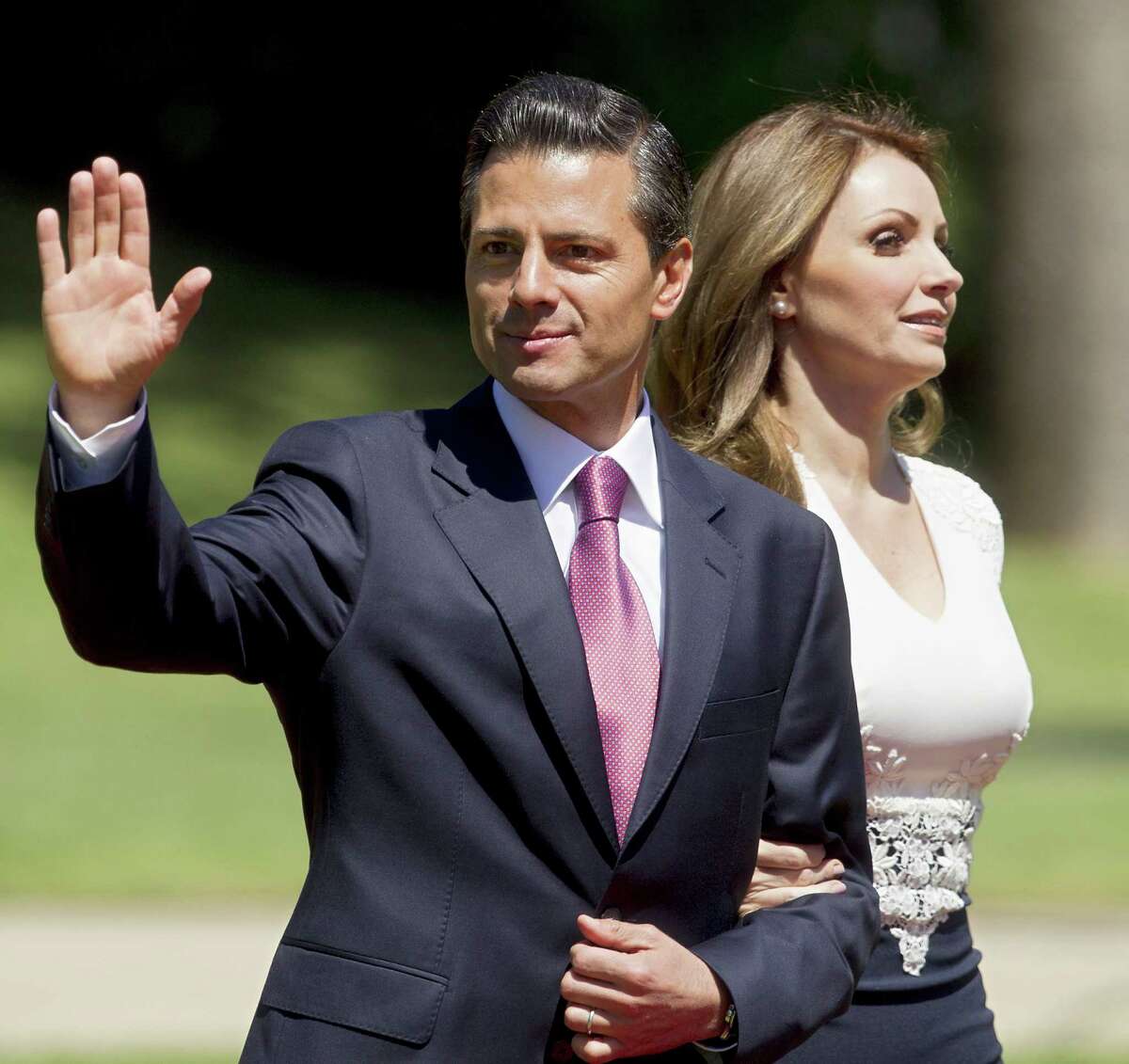 Mexican President Enrique Pena Nieto (L) next to his wife Angelica Rivera waves at the press in Vina Del Mar, Chile on March 11, 2014 after Chilean President Michelle Bachelet's inauguration. Socialist Bachelet took the oath of office as president of Chile Tuesday, returning to power after four years with a reform agenda to reduce social disparities in this prosperous South American countrywave to the press at Cerro Castillo Palace in Vina Del Mar, on March 11, 2014 after Bachelet's inauguration. AFP/Claudio ReyesClaudio Reyes/AFP/Getty Images