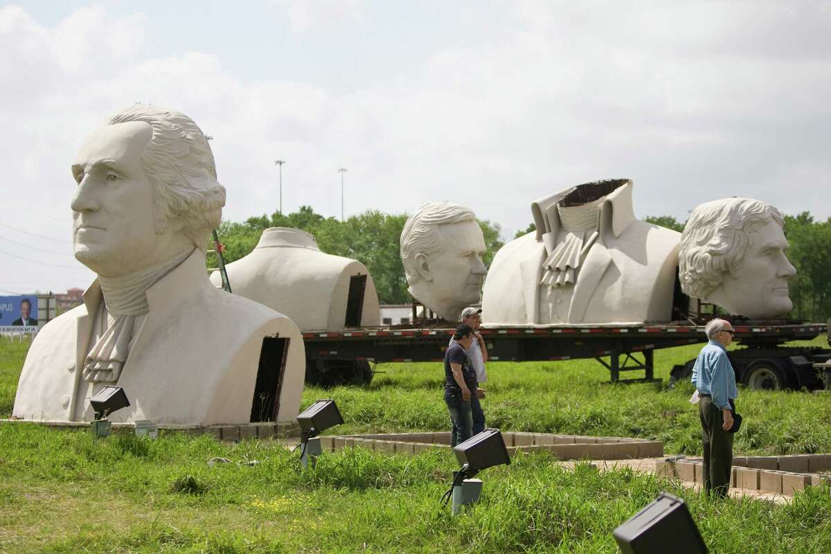 Artist David Adickes, right, supervised the crew that disassembled the presidential busts in Pearland four years ago, saying the art is "waiting for a final home."