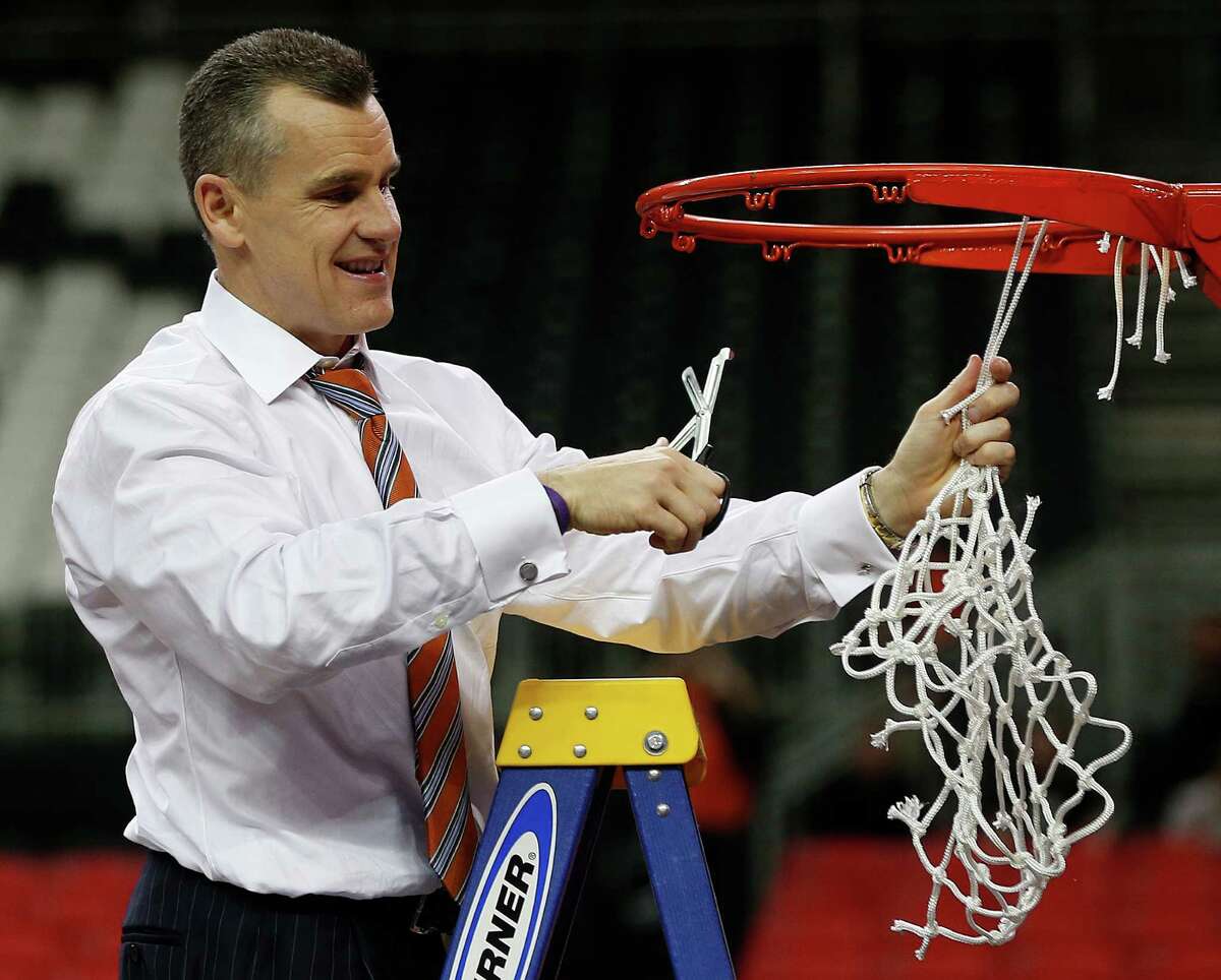 Florida head coach Billy Donovan takes the net after the second half of an NCAA college basketball game against Kentucky in the Championship round of the Southeastern Conference men's tournament, Sunday, March 16, 2014, in Atlanta. Florida won 61-60. (AP Photo/John Bazemore) ORG XMIT: GAMS158