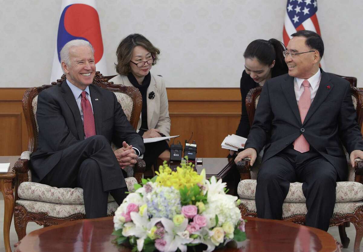 U.S. Vice President Joe Biden (L) talks with South Korean Prime Minister Jung Hong-Won (R) during their meeting in December. Among the topics they discussed was the Trans-Pacific Partnership, which critics want to derail.