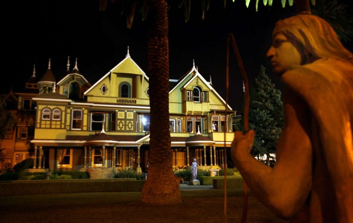 The Winchester Mystery House in San Jose seen at night.