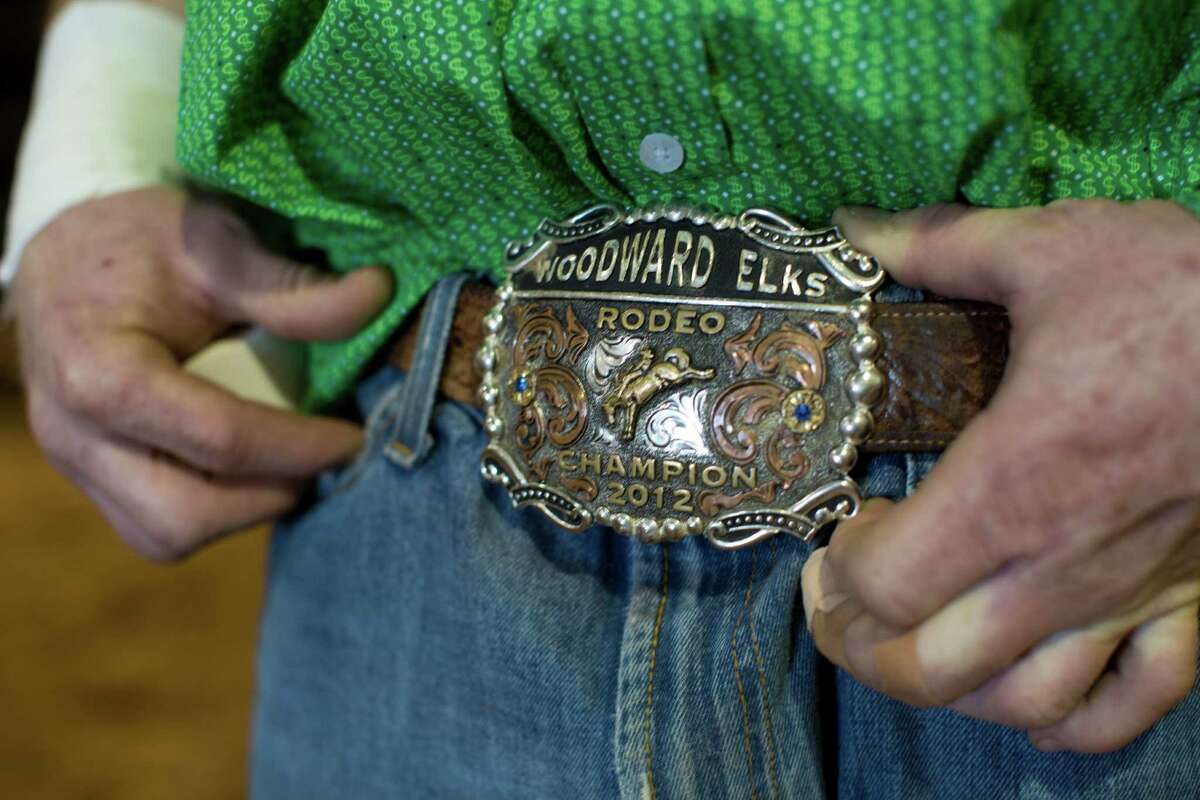 Rodeo competitors show their pride with trophy buckles