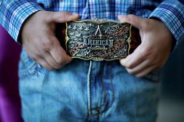 jesus holds up my pants belt buckle