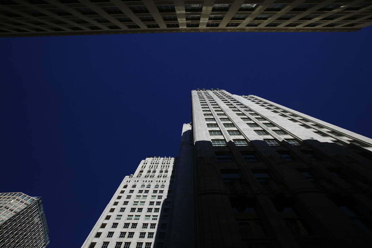 The top of 140 New Montgomery Street (bottom) is seen with the tops of other neighboring buildings on Tuesday, March 18, 2014, in San Francisco, Calif.