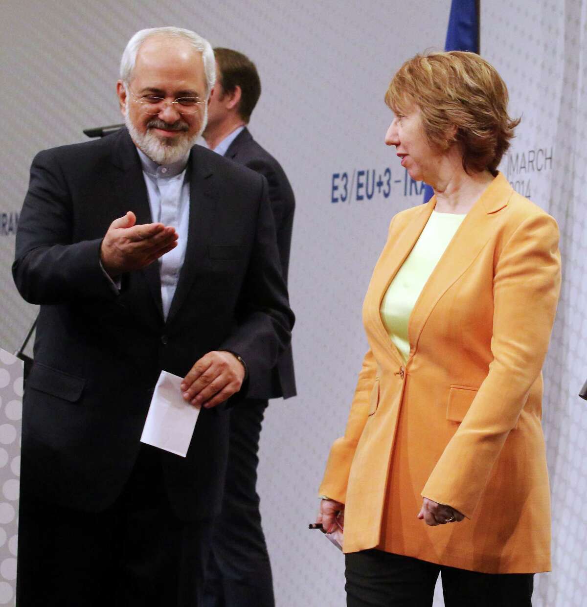 European foreign policy chief Catherine Ashton, left, and Iranian Foreign Minister Mohamad Javad Zarif, right, leave a news conference after closed-door nuclear talks in Vienna, Austria, Wednesday, March 19, 2014. They said the talks addressed Iran's uranium enrichment program, a nearly finished nuclear reactor and the lifting of sanctions on Iran that have been imposed successively over the past decade as Tehran expanded its atomic activities. The talks will resume April 7 in Vienna. (AP Photo/Ronald Zak)