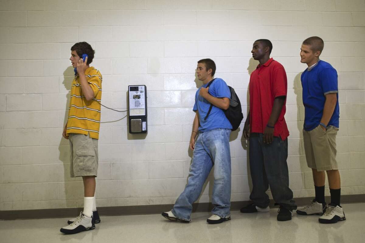 Call your mom for a ride home from a pay phone. Even better, wait in line to call your mom.
