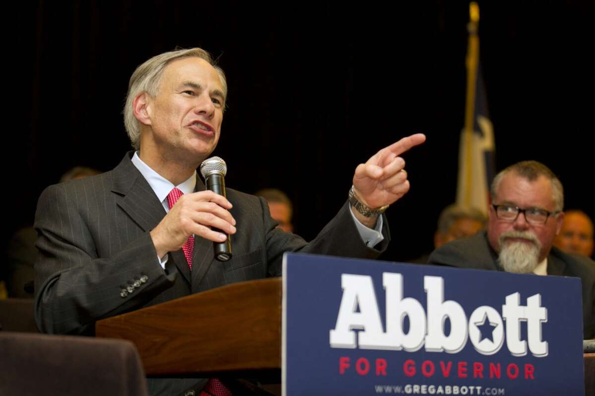 FILE - In this Nov. 1, 2013, file photo, Texas Attorney General Greg Abbott speaks at a convention of the Combined Law Enforcement Associations of Texas in Austin, Texas. Public education is emerging as a central issue in the Texas governors race between Republican Abbott and Democratic state Sen. Wendy Davis. (AP Photo/Austin American-Statesman, Jay Janner, File)
