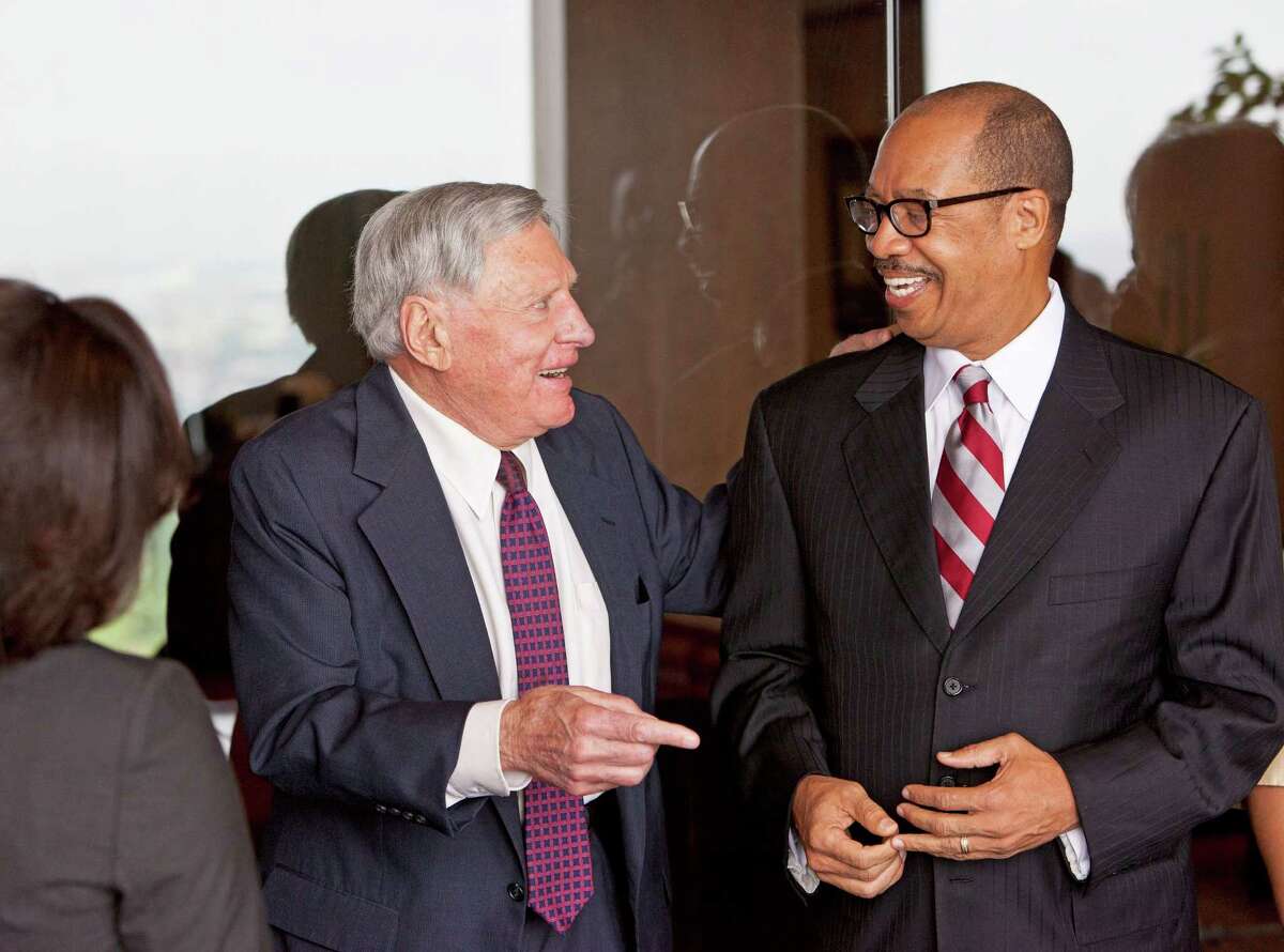 Attorney Joe Jamail donates a $3 million collection of his law library to TSU's Thurgood Marshall School of Law. The event is held in his law office at Jamila & Kolius, One Allen Center, 500 Dallas Street, Suite 3434. ID L-R: Attorney Joe Jamail regales students and faculty from TSU with stories from a lifetime as a legendary trial attorney; Dr. John M. Rudley, President. Tuesday 4/04/12 (Craig H. Hartley/For the Chronicle)