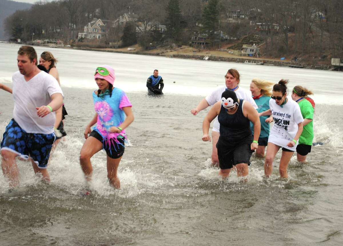 Hundreds braved cold and rain Saturday, March 22, 2014 for the 5th Annual Polar Plunge, a fundraiser for the Special Olympics at Candlewood Lake, Danbury, Were you SEEN?