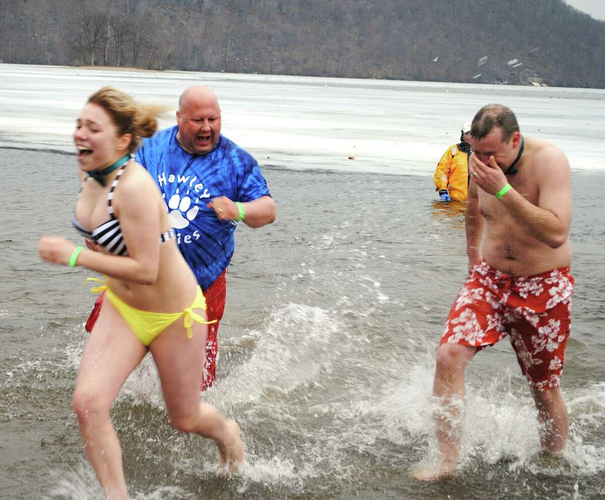 Hundreds braved cold and rain Saturday, March 22, 2014 for the 5th Annual Polar Plunge, a fundraiser for the Special Olympics at Candlewood Lake, Danbury, Were you SEEN?