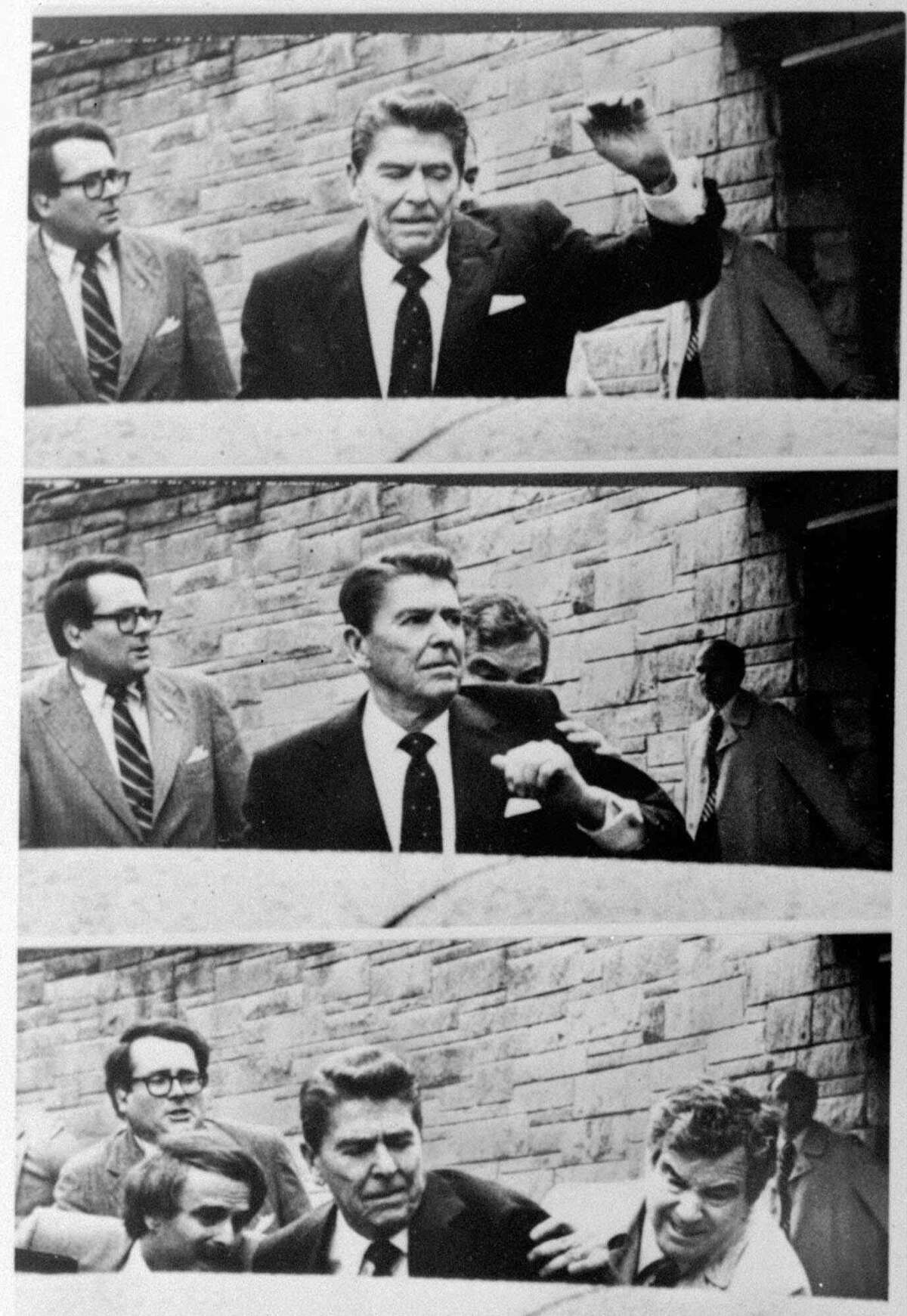 President Reagan waves, then looks up before being shoved into the Presidential limousine by Secret Service agents after being shot outside a Washington hotel in this photo sequence.
