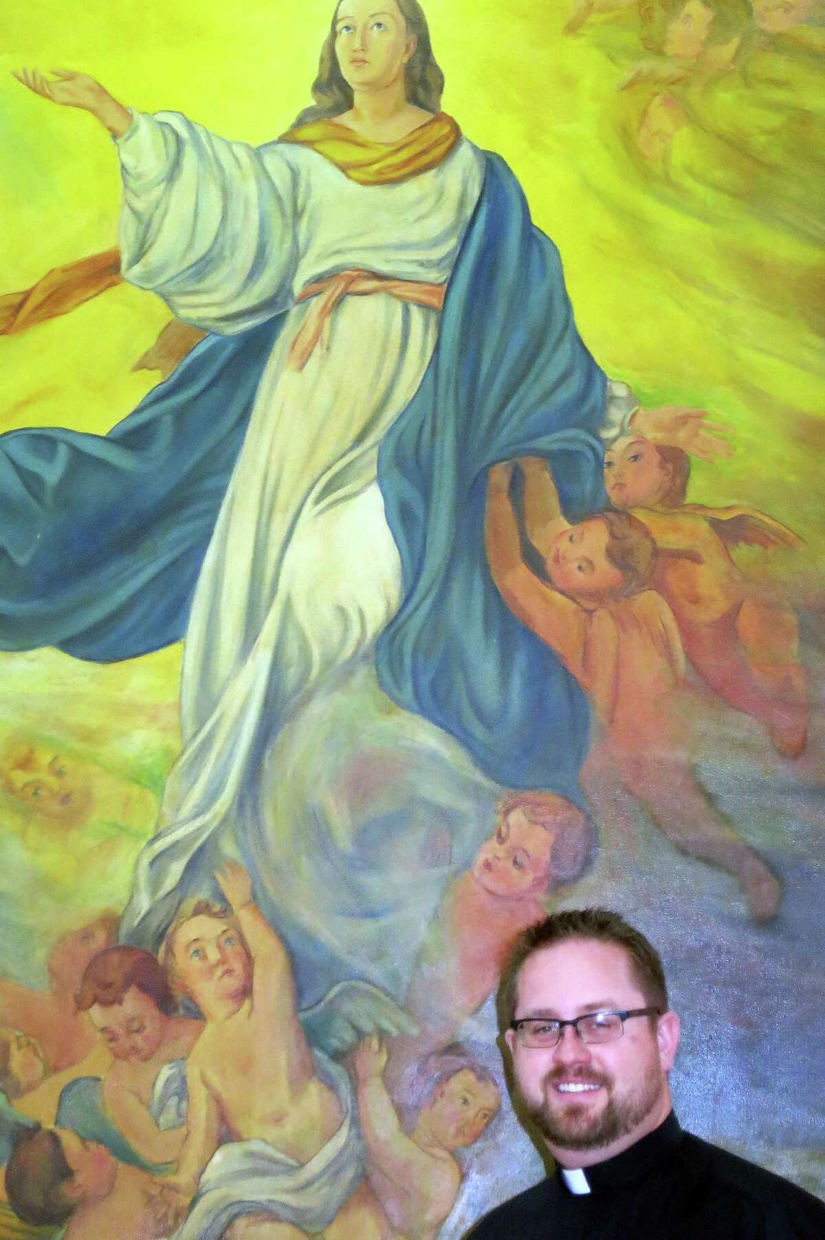 Father Daniel Dreher said the angel on the Assumption painting is modeled after a daughter of one of the Italian POWs. Decades later she visited the church.
