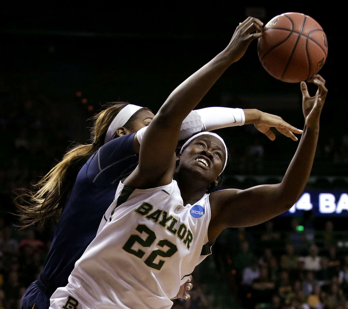Baylor's Sune Agbuke grabs a rebound in front of California's Reshanda Gray. The Lady Bears led just 34-33 at halftime.
