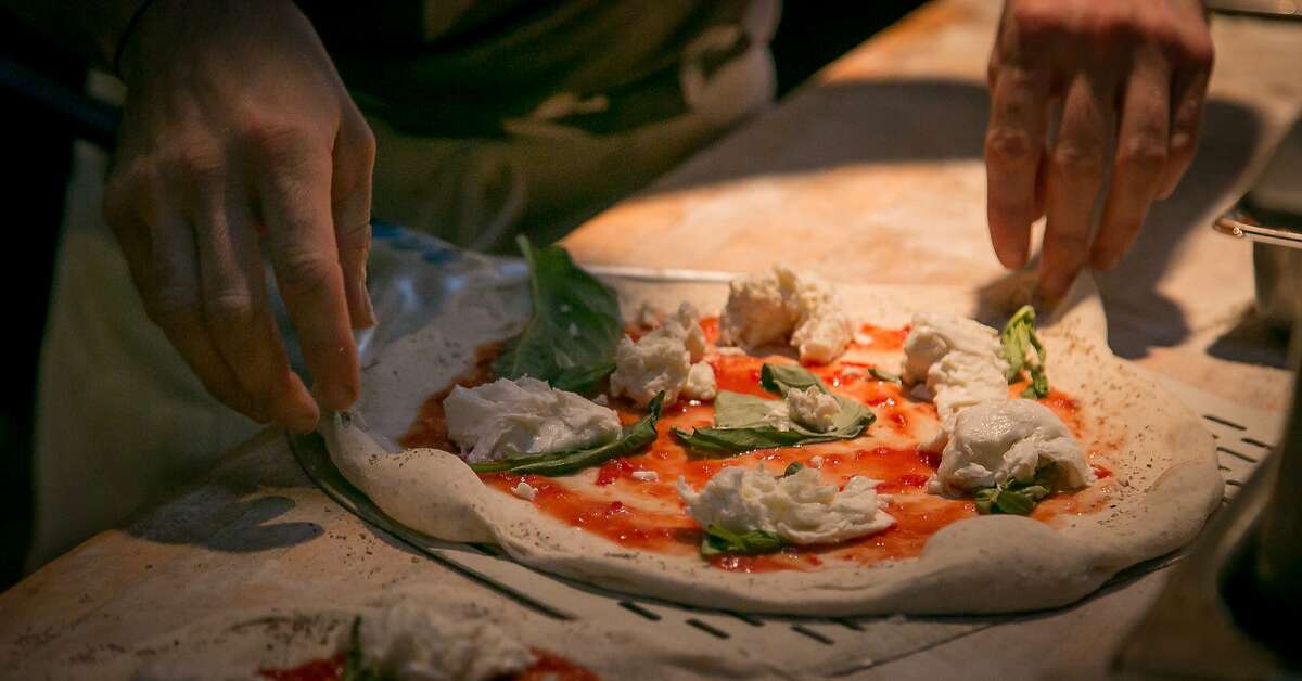 A Margherita pizza being made at Pizza Hacker in San Francisco, Calif., on Thursday, March 20th, 2014.