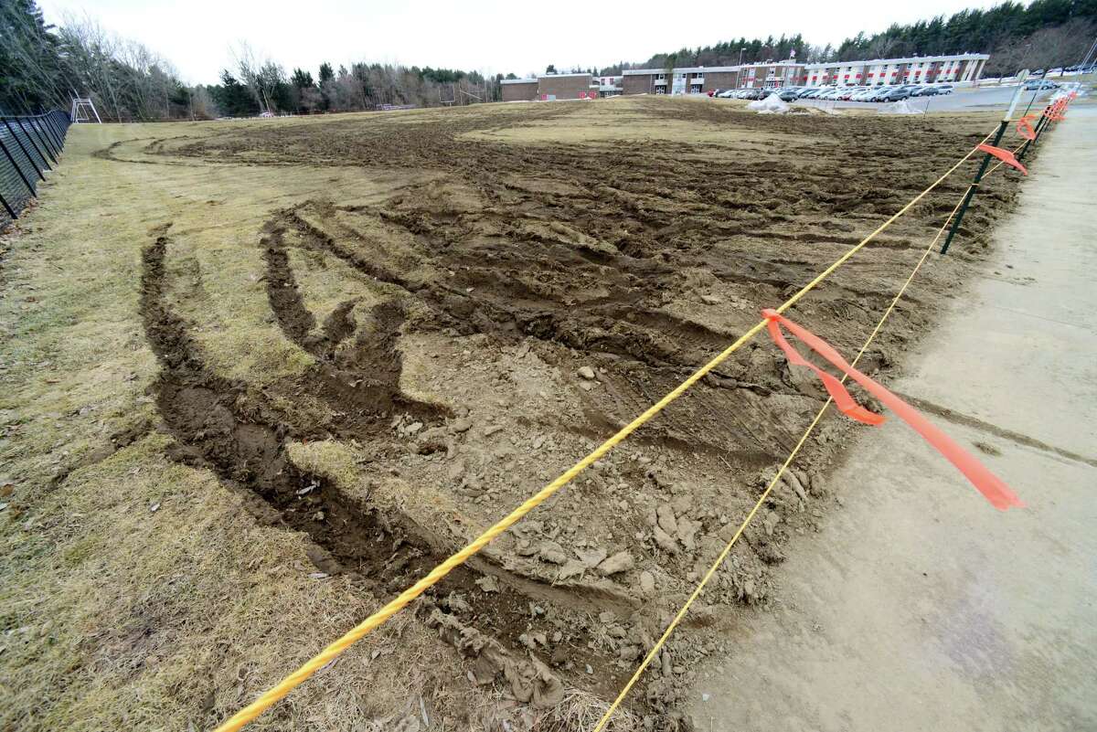 Damaged athletic fields at Farnsworth Middle School Tuesday, march 25, 2014, which occurred after participants in a state civil service exam held last weekend parked on the Guilderland, N.Y., fields after school parking had reached capacity. (Will Waldron/Times Union)
