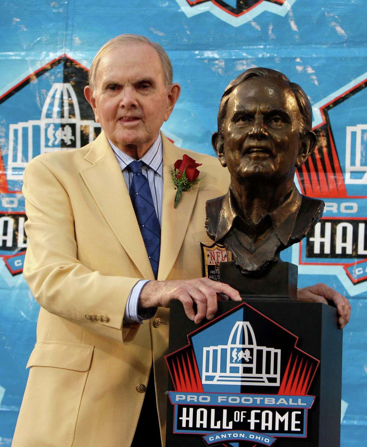 FILE - In this Aug. 8, 2009, file photo, founder and owner of the Buffalo Bills, Ralph Wilson Jr., stands with his bronze bust during the Pro Football Hall of Fame induction ceremony at the Pro Football Hall of Fame, Saturday, Aug. 8, 2009, in Canton, Ohio. Bills owner Wilson Jr. has died at his home in Grosse Pointe Shores, Mich., Tuesday, March 25, 2014. He was 95. Bills president Russ Brandon made the announcement at the NFL winter meetings in Orlando, Fla. Wilson Jr. was one of the original founders of the American Football League and owned the Bills for the last 54 years. (AP Photo/Tony Dejak, File)