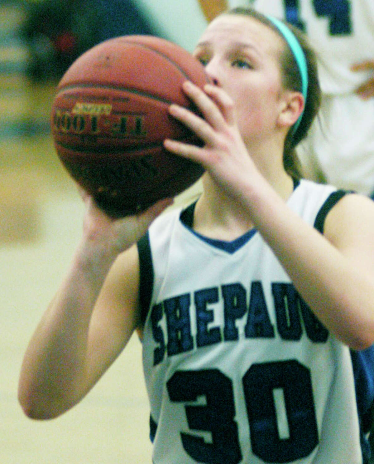 Samantha Moravsky of the Spartans focuses on a free throw during Shepaug Valley High School girls' basketball's season-ending 38-33 defeat to Terryville in Washington, Feb.22, 2014.