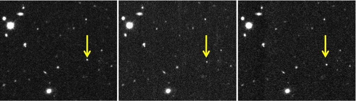 This combination of images provided by the Carnegie Institution for Science shows a new solar system object - 2012 VP113 - indicated by the yellow arrow, observed on November 2012 through a telescope in Chile.