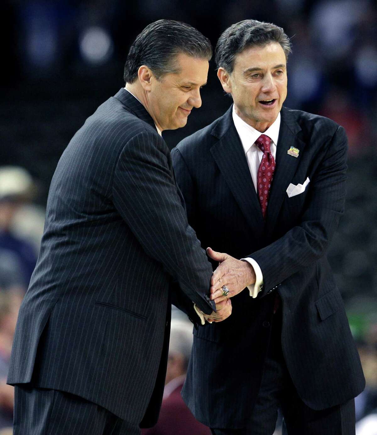 Kentucky coach John Calipari, left, and Louisville counterpart Rick Pitino are more congenial than the fans of the fierce rivals.