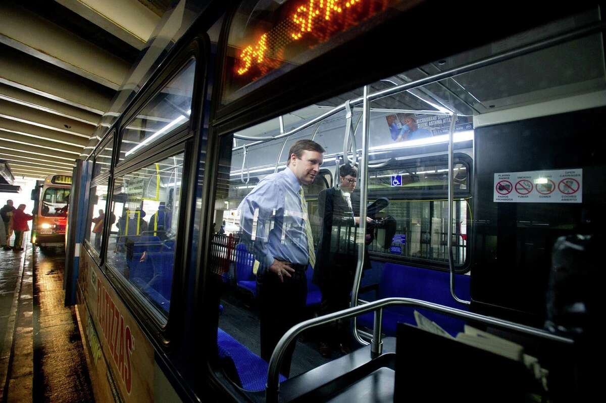Sen. Chris Murphy rides a Stamford bus from the transit center up the Hope Street line on Friday, March 28, 2014.