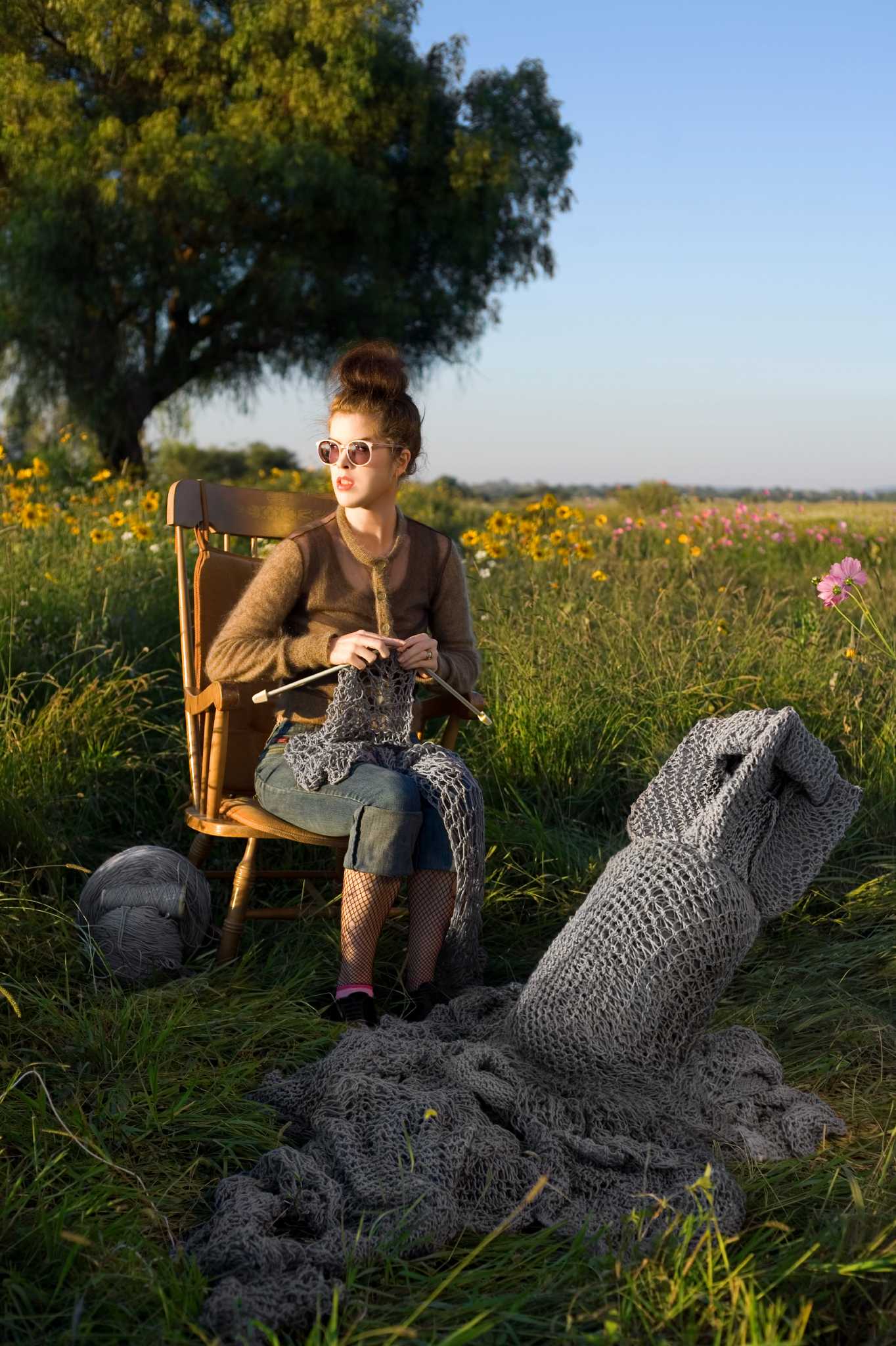 She is knitting