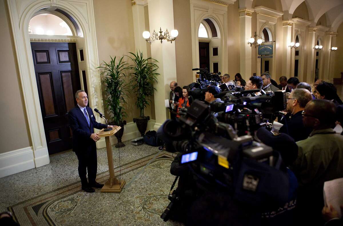 California Senate President Pro Tem Darrell Steinberg, D-Sacramento, speaks to the media about a resolution to suspend three Democrats who face charges in criminal cases outside of his Capitol office in Sacramento, Calif., on Friday, March 28, 2014. The resolution which passed 28-1 prevents Democratic Sens. Ron Calderon, Leland Yee and Rod Wright from exercising any power of their office until the pending criminal cases against them have been resolved.(AP Photo/Steve Yeater)