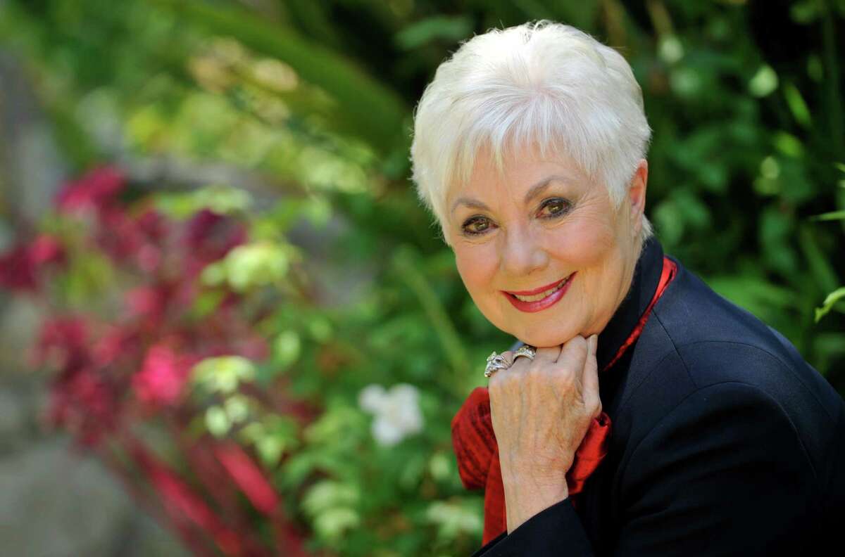 FILE - In this July 15, 2013 file photo, actress Shirley Jones poses for a portrait at her home in Los Angeles. Jones wants to mark her 80th birthday with a high-flying adventure. The Oscar-winning actress and singer says she plans to go skydiving on Monday, March 31, 2014, her birthday, for the first time. (Photo by Chris Pizzello/Invision/AP, File)