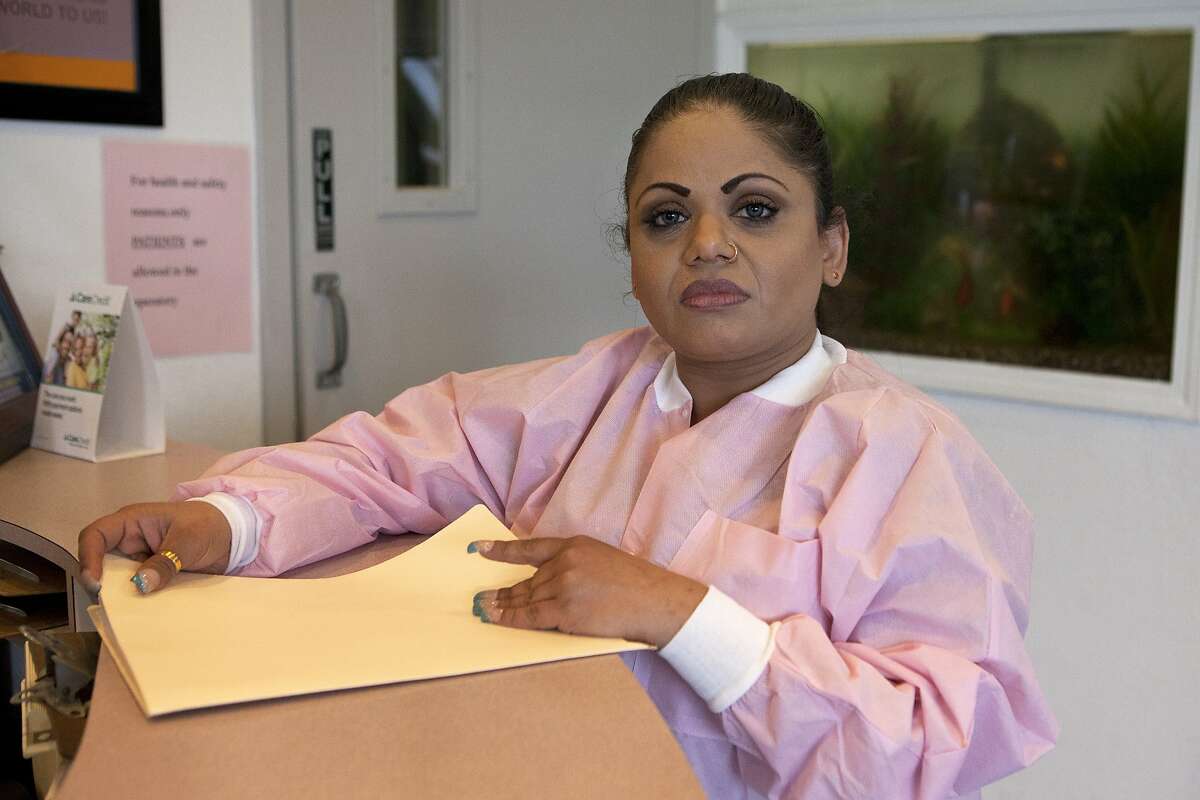 Artika Singh, a dental assistant for Wilson Lim, D.M.D., at his office in Daly City, Calif. on March 29, 2014. Lim was recently accused of conspiracy to deal firearms without a license and conspiracy to illegally import firearms, along with Leland Yee. Singh believes Lim is innocent.