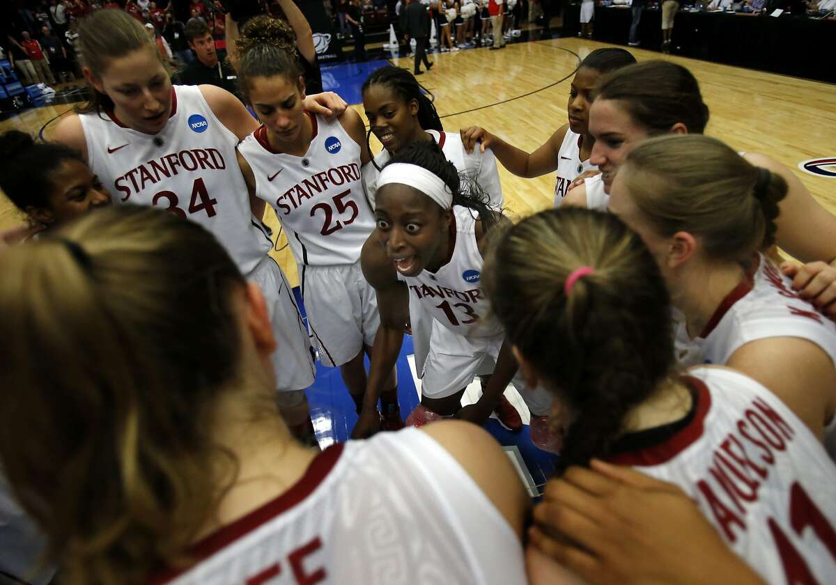 Chiney Ogwumike (13) celebrated with her teammates after the Stanford victory Sunday March 30, 2014. The women's Stanford Cardinal basketball team defeated the Penn State Lady Lions 82-57 in the third round of the NCAA tournament at Maples Pavilion.