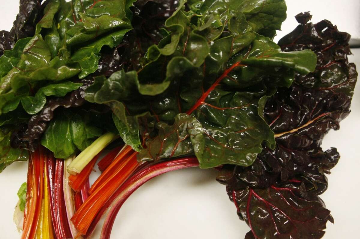 A bunch of rainbow Swiss chard awaits preparation at Radio Africa & Kitchen on February 8, 2014 in San Francisco, Calif.
