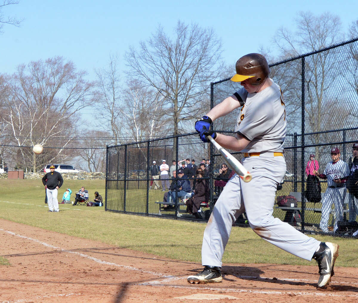 Brunswick's Ryan Popp hits a three-run home run in the bottom of the 3rd inning in the high school baseball game between Brunswick School and Hopkins School at Brunswick School in Greenwich, Wednesday, April 2, 2014. Brunswick defeated Hopkins, 8-2, with Brunswick's Bradley Wilpon getting the win.