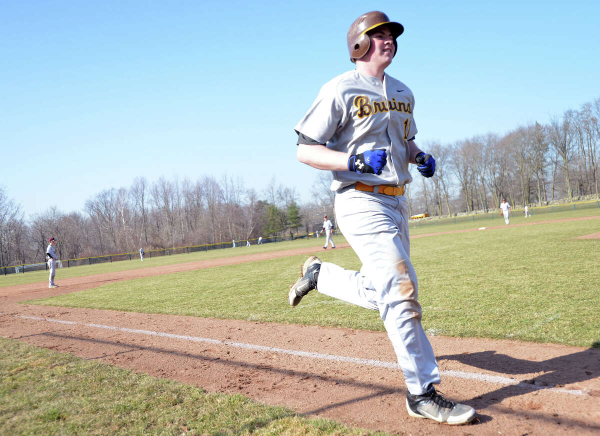 Brunswick's Ryan Popp heads for home after hitting a three-run home run in the bottom of the 3rd inning in the high school baseball game between Brunswick School and Hopkins School at Brunswick School in Greenwich, Wednesday, April 2, 2014. Brunswick defeated Hopkins, 8-2, with Brunswick's Bradley Wilpon getting the win.
