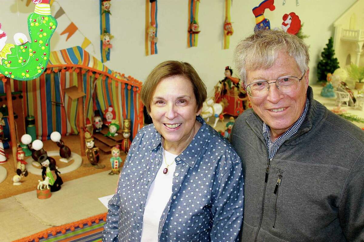 Berna and Joseph Heyman pose in front of a circus display, part of the Mildred Vrooman Easter Egg Collection, in Schoharie. The Heyman's are opening the collection to the public to benefit the Schoharie Free Library. (Christopher Lisio)