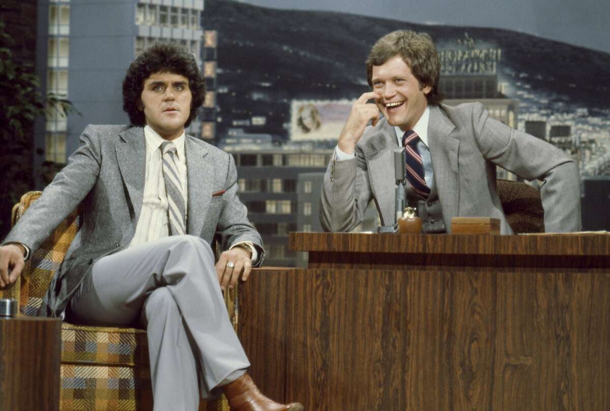 THE TONIGHT SHOW STARRING JOHNNY CARSON -- Air Date 07/04/1979 -- Pictured: (l-r) Comedian Jay Leno during an interview with guest host David Letterman on July 4, 1979 (Photo by Paul Drinkwater/NBC/NBCU Photo Bank via Getty Images)
