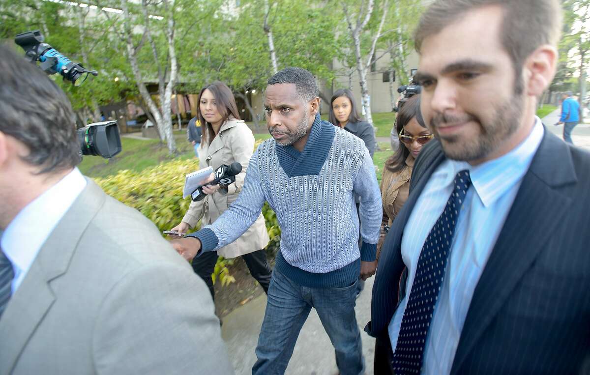 Keith Jackson, who faces federal charges in connection with an investigation into state Sen. Leland Yee, leaves jail in Oakland, Calif., on Thursday, April 3, 2014. Jackson, a former San Francisco school board president, is charged with gun running, drug trafficking and arranging a purported murder for hire.