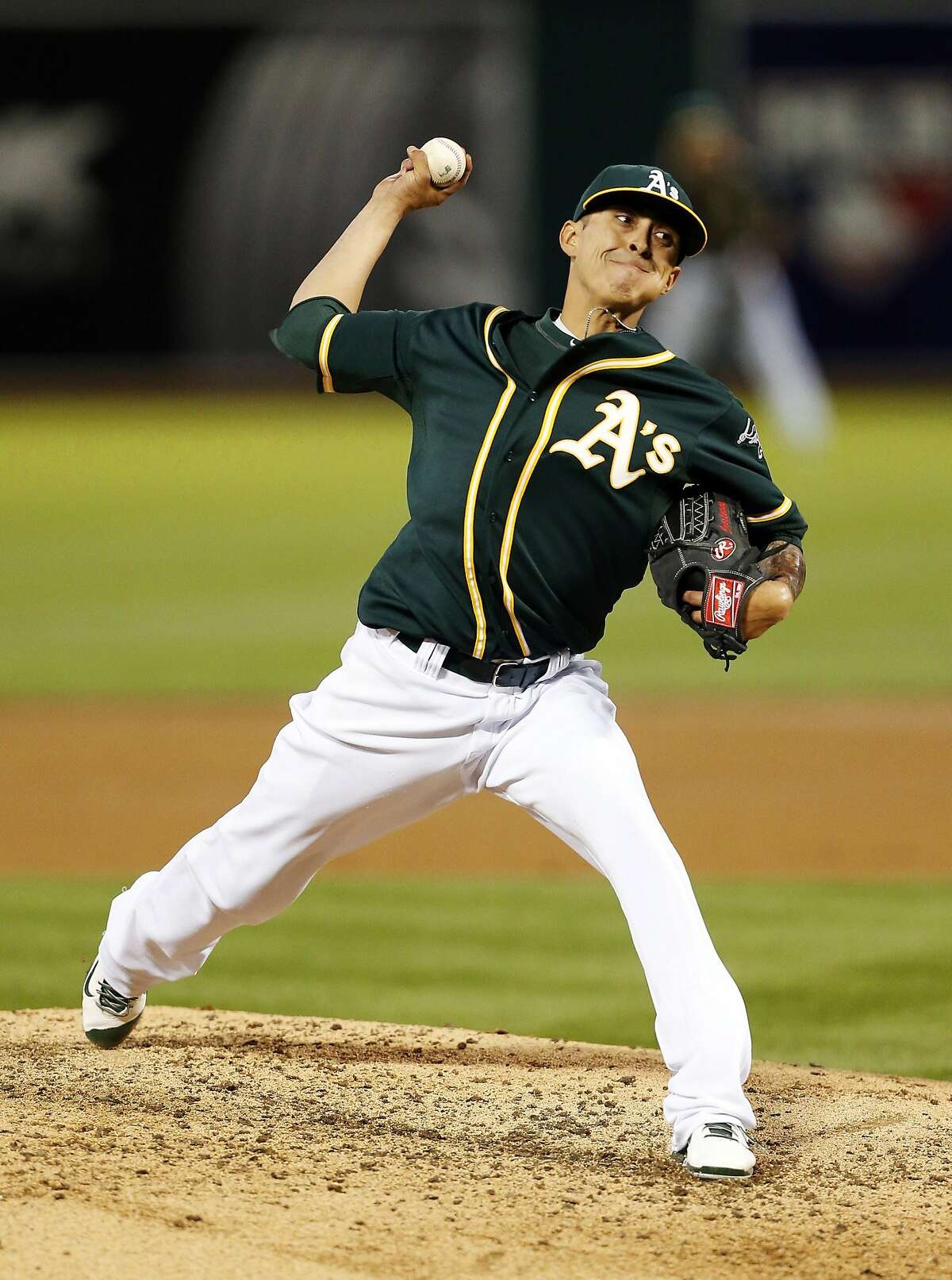 Oakland Athletics pitcher Jesse Chavez throws during the third inning of a baseball game against the Seattle Mariners, Thursday, April 3, 2014, in Oakland, Calif. (AP Photo/Beck Diefenbach)