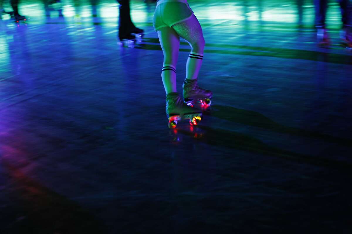 A skater's wheels light up at the Church of 8 Wheels on Fillmore Street on March 19, 2014 in San Francisco, Calif. The Church of 8 Wheels is the brainchild of David Miles, Jr. and features roller skating several nights a week in a disused church at 554 Fillmore Street. Many people dress in for events at the roller-rink.