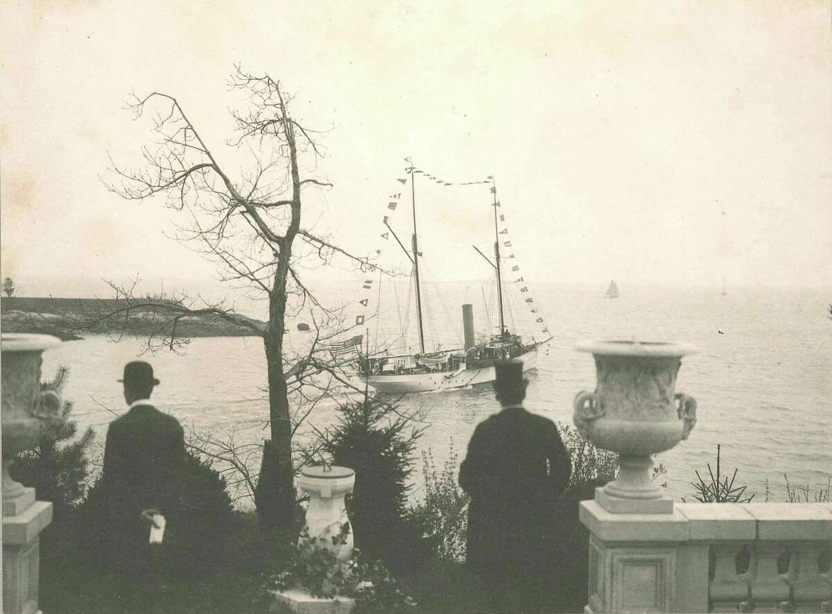 Commodore E. C. Benedict's Gilded Age yacht, Oneida, sails off into Greenwich Harbor.