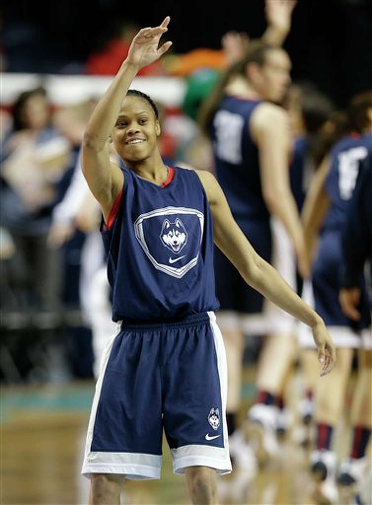 Connecticut guard Moriah Jefferson waves after practice before the women's Final Four of the NCAA college basketball tournament, Saturday, April 5, 2014, in Nashville, Tenn. Connecticut plays Stanford Sunday. (AP Photo/Mark Humphrey)
